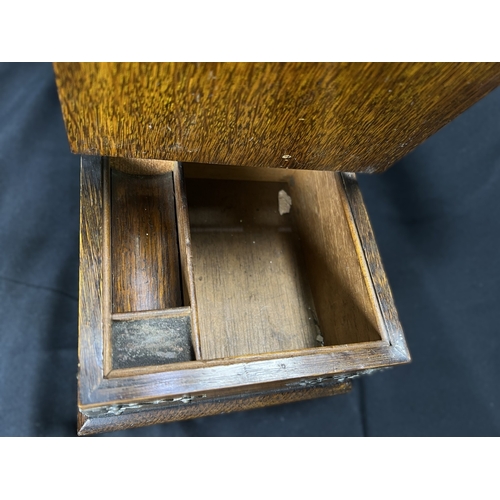 65 - A Victorian oak humidor / smoking companion, space for cigars, cigarettes, matches etc and two other... 