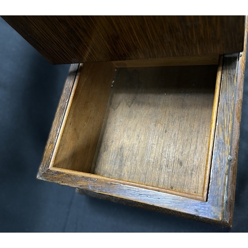 65 - A Victorian oak humidor / smoking companion, space for cigars, cigarettes, matches etc and two other... 