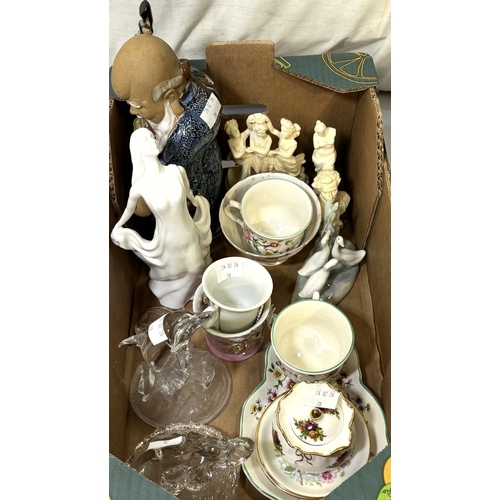 78 - A Chinese figure of a Sage with a small child; glass animal figures, Nao ducks and similar figures.