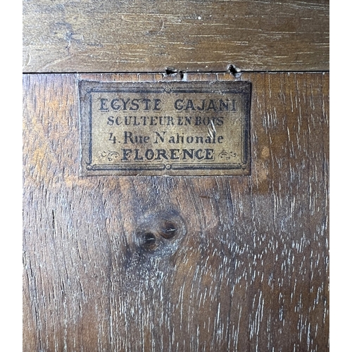 82 - A late 19th / early 20th century Italian carved wooden panel of a goat headed creature, bearing Flor... 