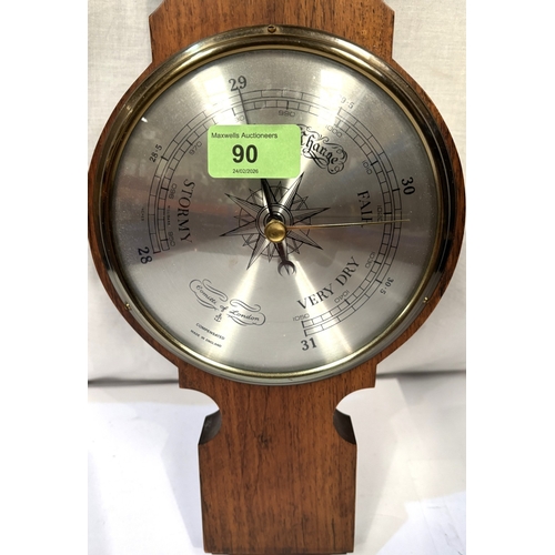 90 - A 19th century brass mantle clock; a wall hanging barometer/thermometer; a cased pair of binoculars.