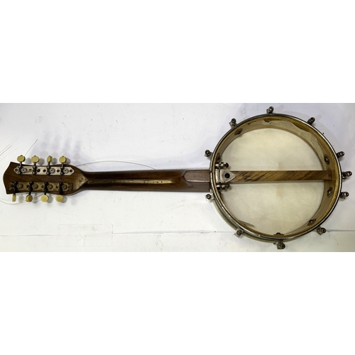 91 - A cased UKELELE banjo/mandolin.