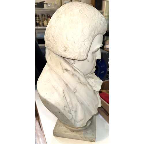 27 - A large heavy reconstituted marble bust of a 19th century gentleman in wig, height 46cm