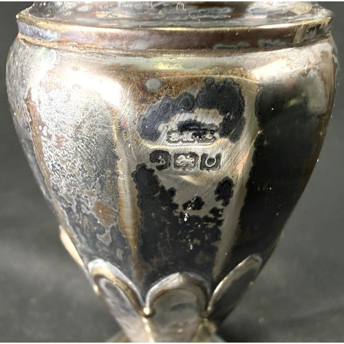 627A - A hallmarked silver sugar dredger with ribbed decoration and weighted pedestal base, Birmingham 1938... 