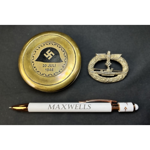 190A - A WWII period German U-boat Kriegsmarine badge, marked Schwerin to the reverse, and a reproduction c... 