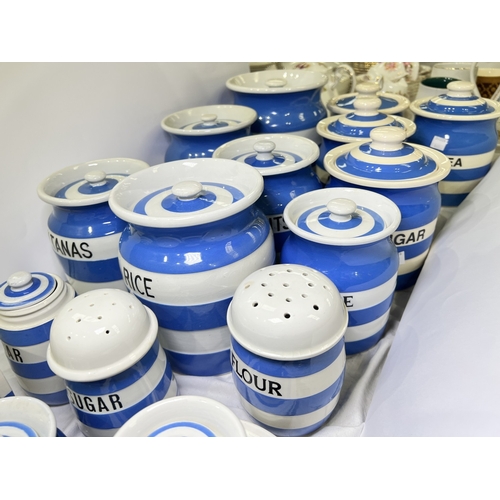 460 - A collection of T&G Green storage ware with stencilled names