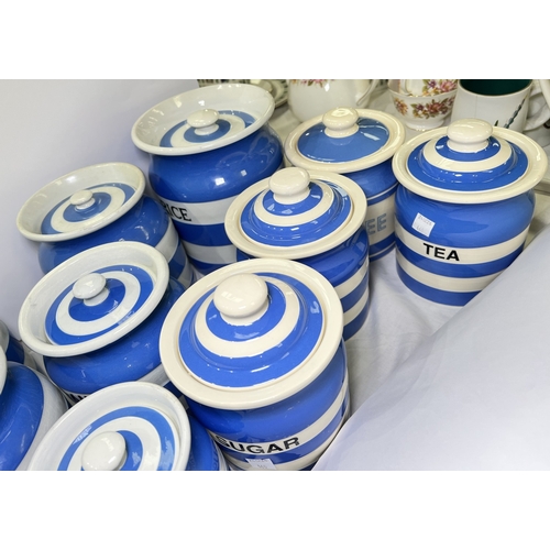 460 - A collection of T&G Green storage ware with stencilled names