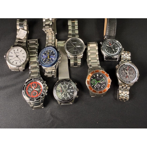544B - 8 gents sports watches.