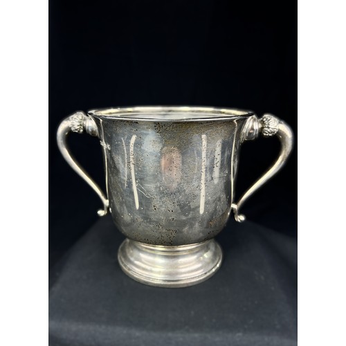 537 - A 2 handled hallmarked silver cup on raised circular foot, Birmingham 1902, height 12cm, 8.5ozt