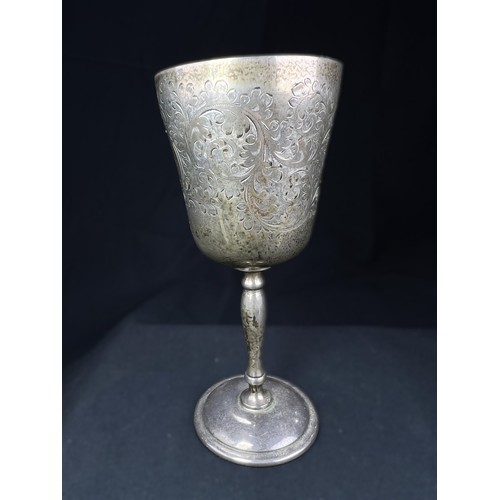609A - A hallmarked silver goblet with chased decoration, Birmingham 1969, 4ozt