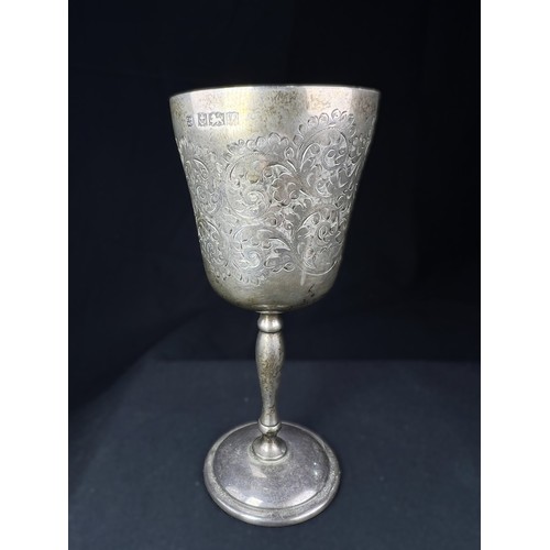 609A - A hallmarked silver goblet with chased decoration, Birmingham 1969, 4ozt