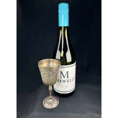 609A - A hallmarked silver goblet with chased decoration, Birmingham 1969, 4ozt