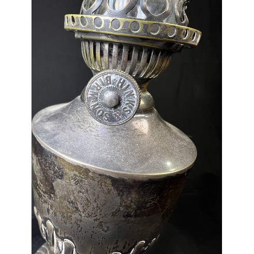 616C - A hallmarked silver oil lamp with gadrooned lower body and pedestal  base, London 1894, Weighted bas... 