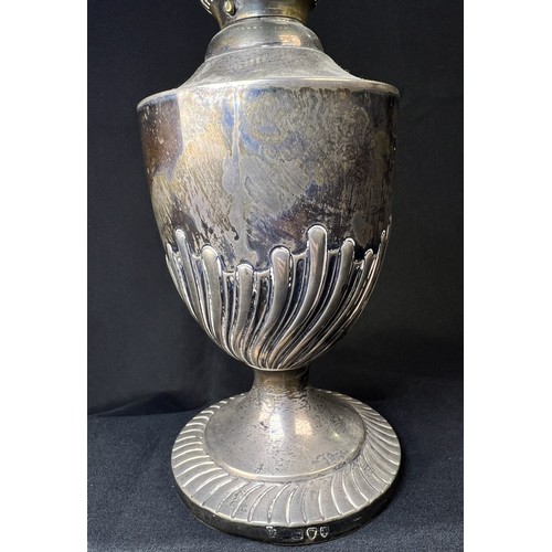 616C - A hallmarked silver oil lamp with gadrooned lower body and pedestal  base, London 1894, Weighted bas... 