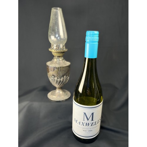 616C - A hallmarked silver oil lamp with gadrooned lower body and pedestal  base, London 1894, Weighted bas... 