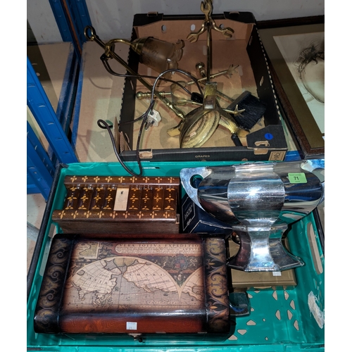 71 - An Arts and Crafts silver plated table centre and classical lamps.