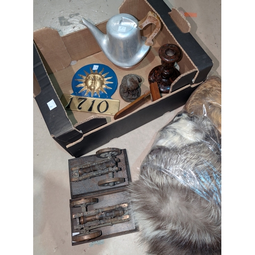 84A - A pair of ornamental miniature cannons; a fire mark; a Picquot teapot; 2 fur collars including a sil... 