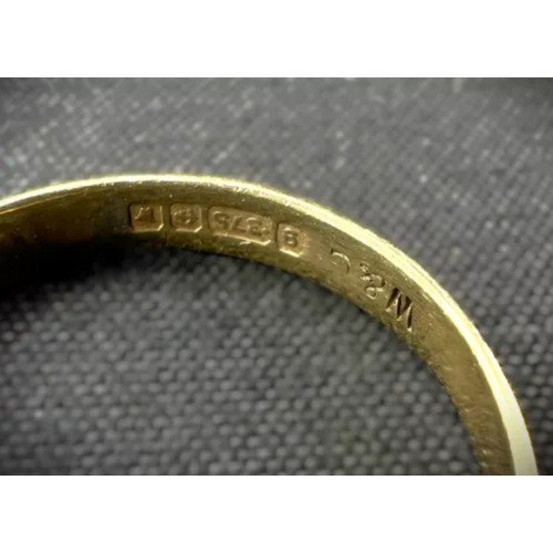 599A - Two 9 carat gold dress rings, garnet and clear stone set, 3.7gms.