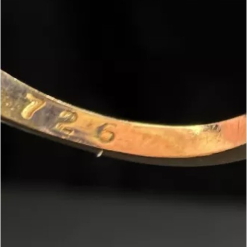 599A - Two 9 carat gold dress rings, garnet and clear stone set, 3.7gms.