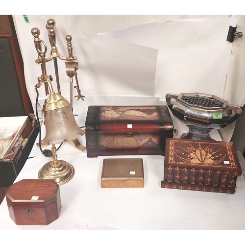 71 - An Arts and Crafts silver plated table centre and classical lamps.