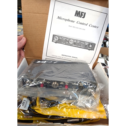23 - Two LDG Electronics AT-200Pro Autotuners boxed and a MFJ Microphone Control centre...