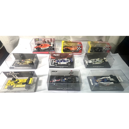 A collection of 9 miniature car racing system vehicles, Flyslot 4 ...