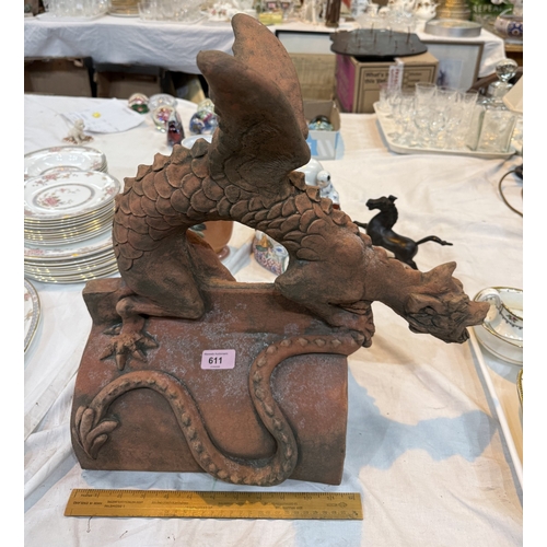 5 - An oriental terracotta garden roof tile in the form of a dragon.