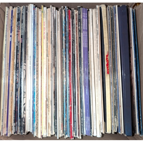 A collection of Rock and Pop records, some 1970's including Eric ...
