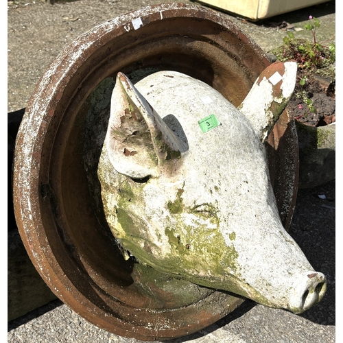 3 - A circular  ceramic garden wall plaque featuring a pig's head in high relief, approx. 65cm diameter