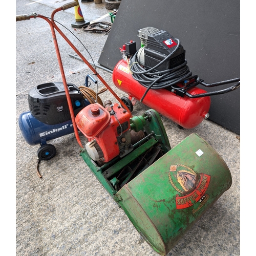 31C - A Suffolk Punch vintage lawn mower and two compressors