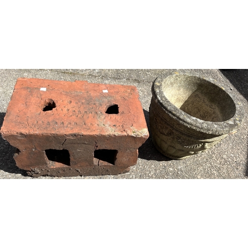 5A - A terracotta garden shelf with acanthus decoration, a reconstituted stoneware jardinière