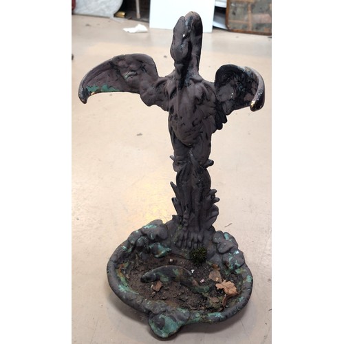 6 - In the manner of Coalbrookdale, a Victorian cast iron stick stand in the form of a heron over fish.