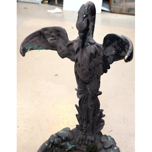6 - In the manner of Coalbrookdale, a Victorian cast iron stick stand in the form of a heron over fish.