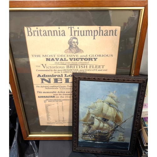 20B - A cased diorama on golf clock, Nelson framed poster, two African masks and a print.