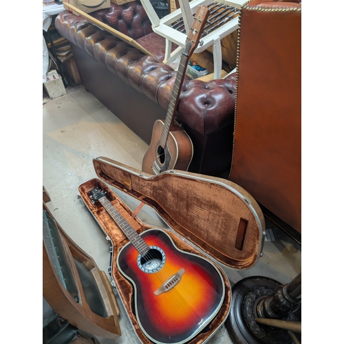 28 - A Matrix vintage acoustic guitar and two others.