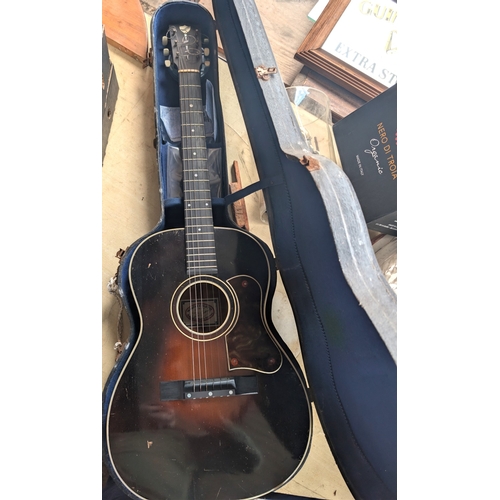 28 - A Matrix vintage acoustic guitar and two others.