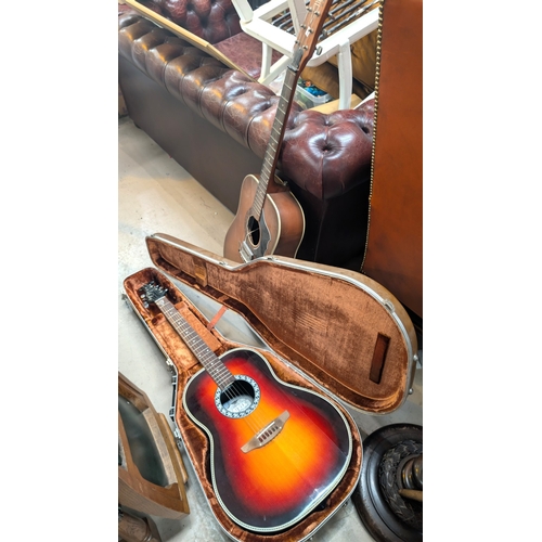28 - A Matrix vintage acoustic guitar and two others.