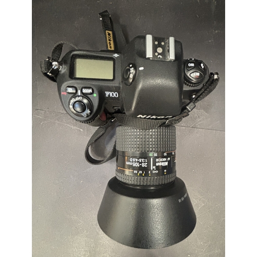 12 - Nikon F100 SLR Camera with Nikon 28-105mm 1:3.5-4.5D, Nikon 28mm 1:2.8 lens and flash