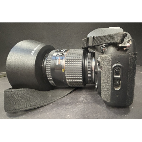 12 - Nikon F100 SLR Camera with Nikon 28-105mm 1:3.5-4.5D, Nikon 28mm 1:2.8 lens and flash
