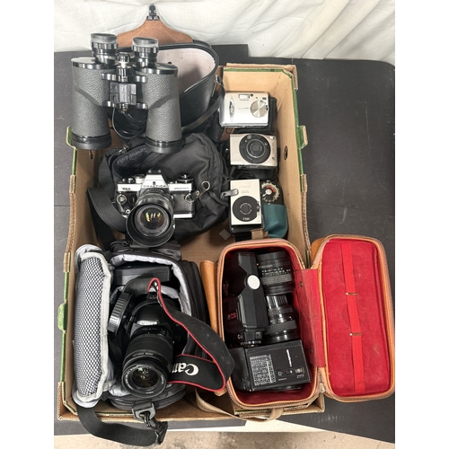 19 - A selection of vintage cameras inc. a Praktica, Canon 450D, A303 Fujifilm Camera, lenses and attachm... 