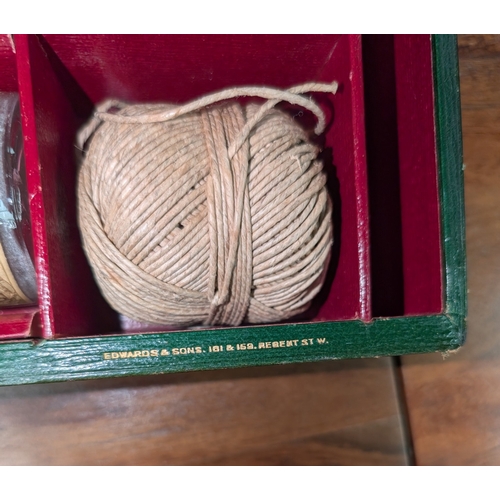 11A - An early 20th century travelling photographic developing kit in green leather case by Edwards & ... 