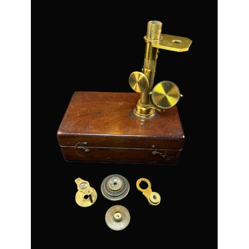 11B - A 19th century miniature/travel microscope in mahogany case