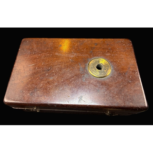 11B - A 19th century miniature/travel microscope in mahogany case