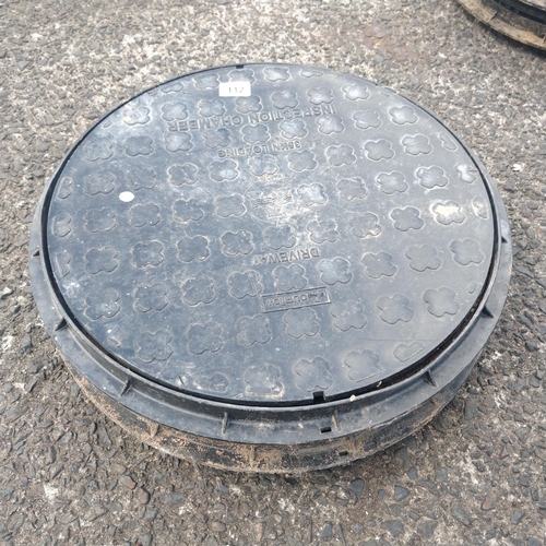 112 - 2 Manhole Covers