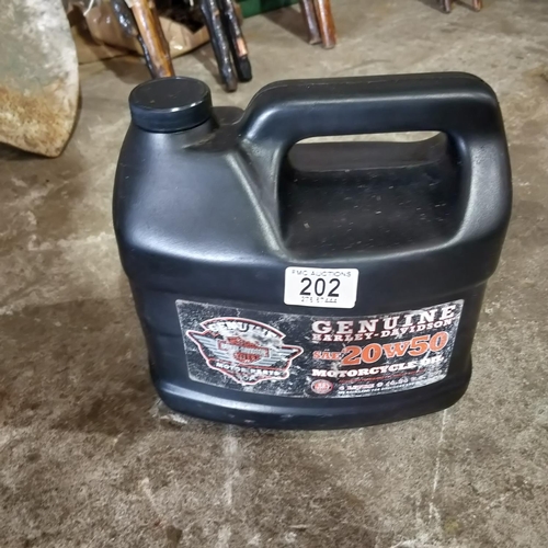 202 - 4L Of Harley Davidson Oil & Handlebars