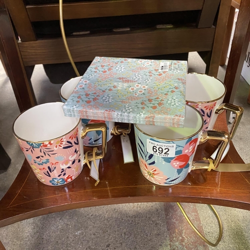 692 - 4 New Mugs & Napkins