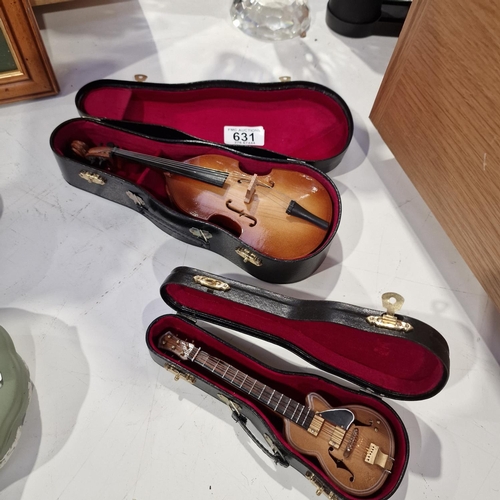 631 - 18cm Model Of A Guitar In Case  24cm Model Of Cello In Case