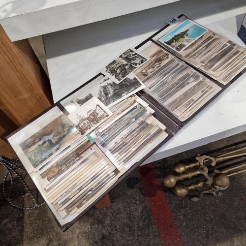 648 - Postcard Album