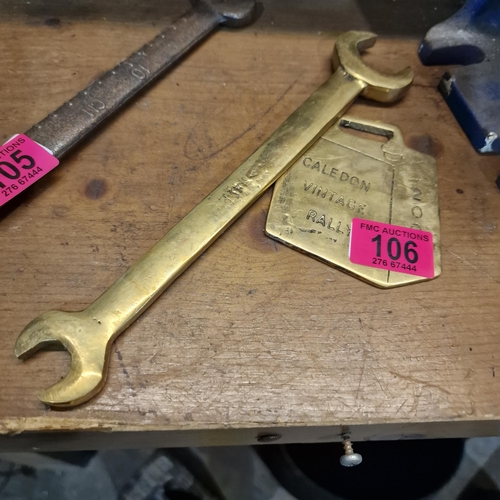 106 - 2 Brass Advertising items