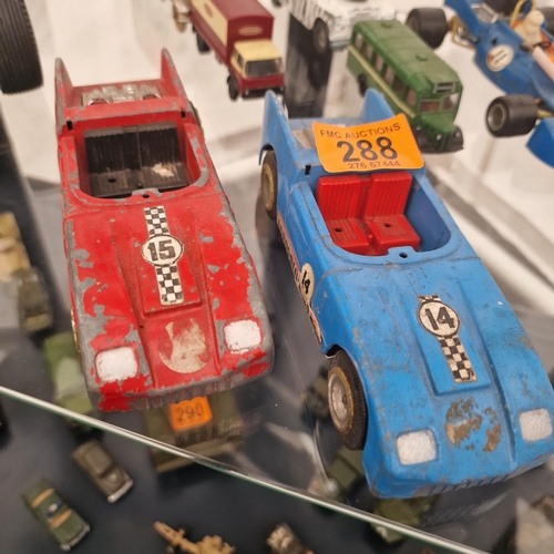 288 - 2 Triang Tin Cars